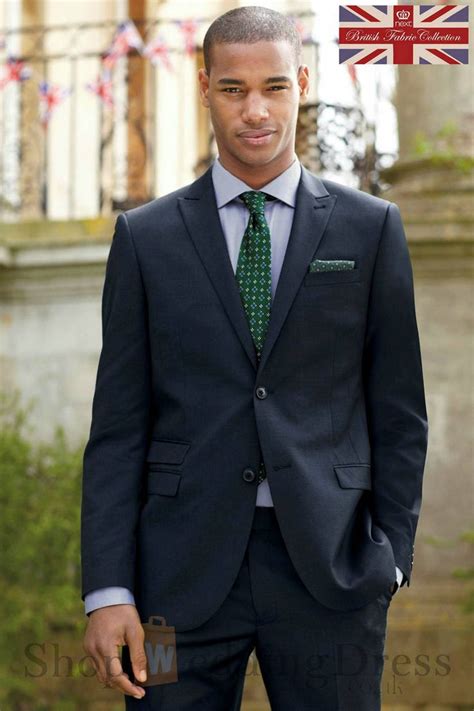 green tie with blue suit